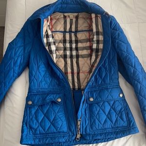 Woman’s Burberry quilted jacket.
